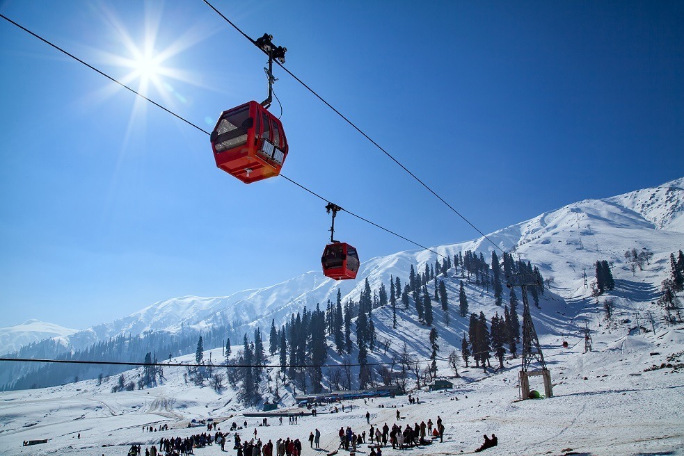 best travel agency for kashmir tour, Gondolas above snowy mountain landscape